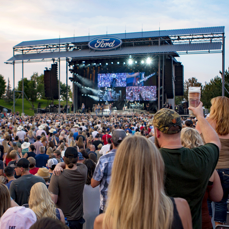 crowd looking at amphitheater stage